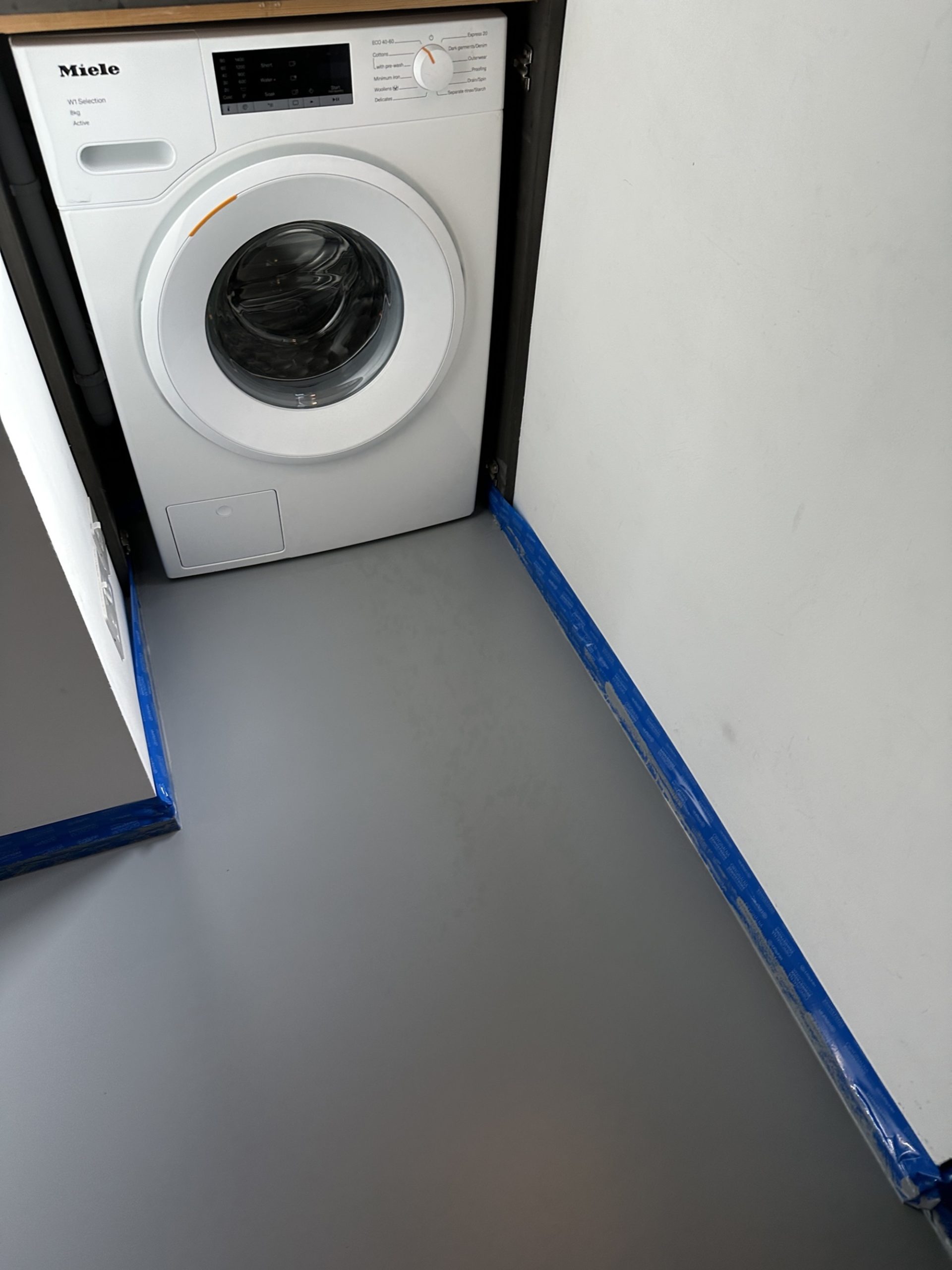 Finished grey resin floor utility room south london.webp in Kennington, London