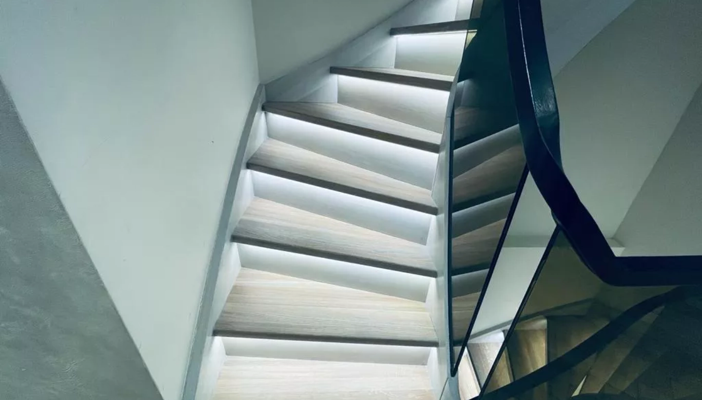 A beautifully oiled oak staircase in Kensington, showcasing a durable and elegant finish that enhances the wood’s natural grain.