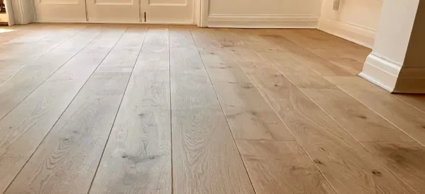 Close-up of a wooden floor with a natural matte finish achieved using Pall-X Pure lacquer.
