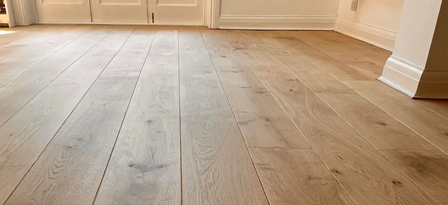 Close-up of a wooden floor with a natural matte finish achieved using Pall-X Pure lacquer.