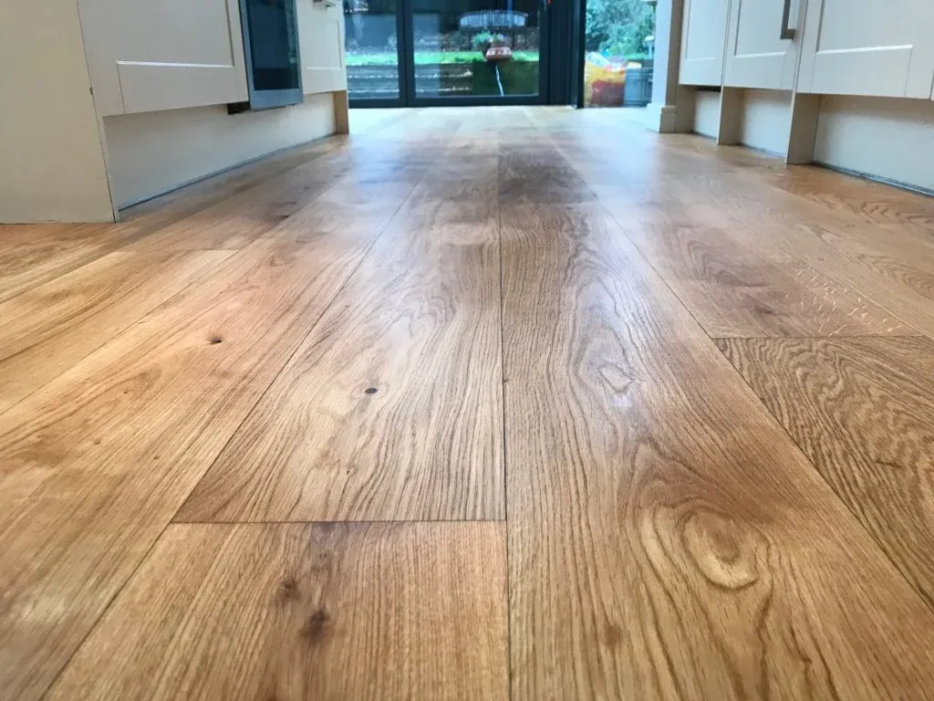 Close-up view of a beautifully restored oak floor in Dulwich Village after professional sanding and oiling, highlighting a smooth natural finish.