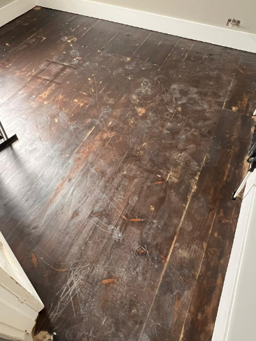 Floorboards sanded by builders