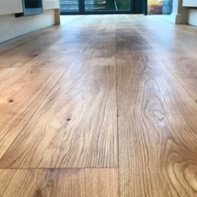 Restored oak floor in a Dulwich Village home after professional sanding and oiling, showcasing a smooth, natural wood finish.