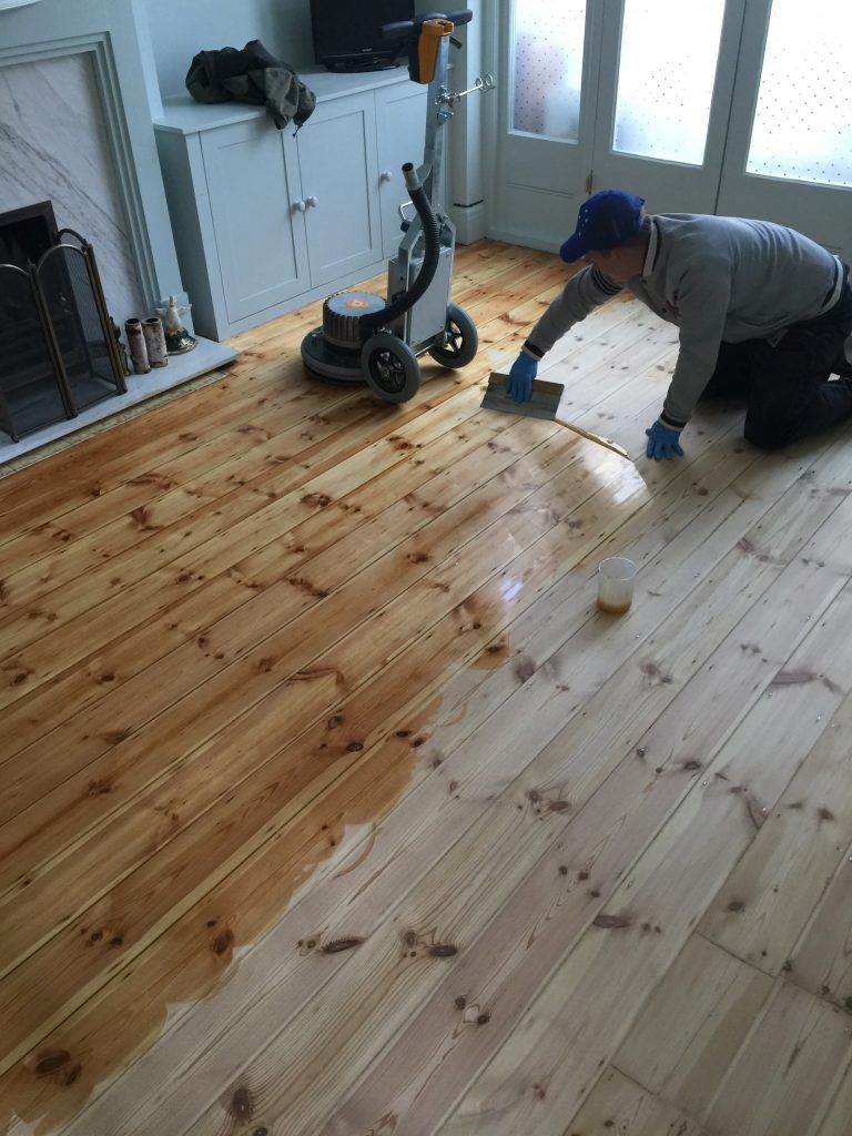 Pine floor finishing after sanding in a London home