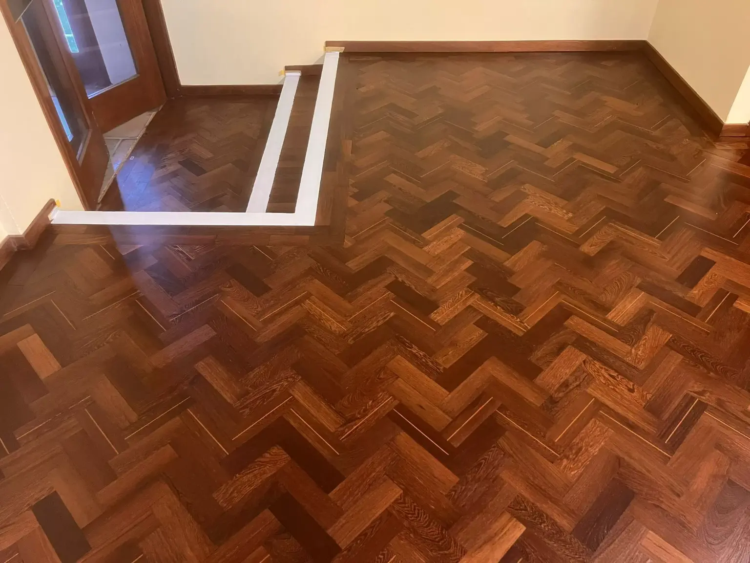 Matte-finished Wenge wood floor in church showing even tone and smooth surface