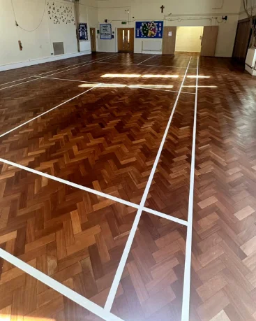 Floor repairs and sanding caterham in a school