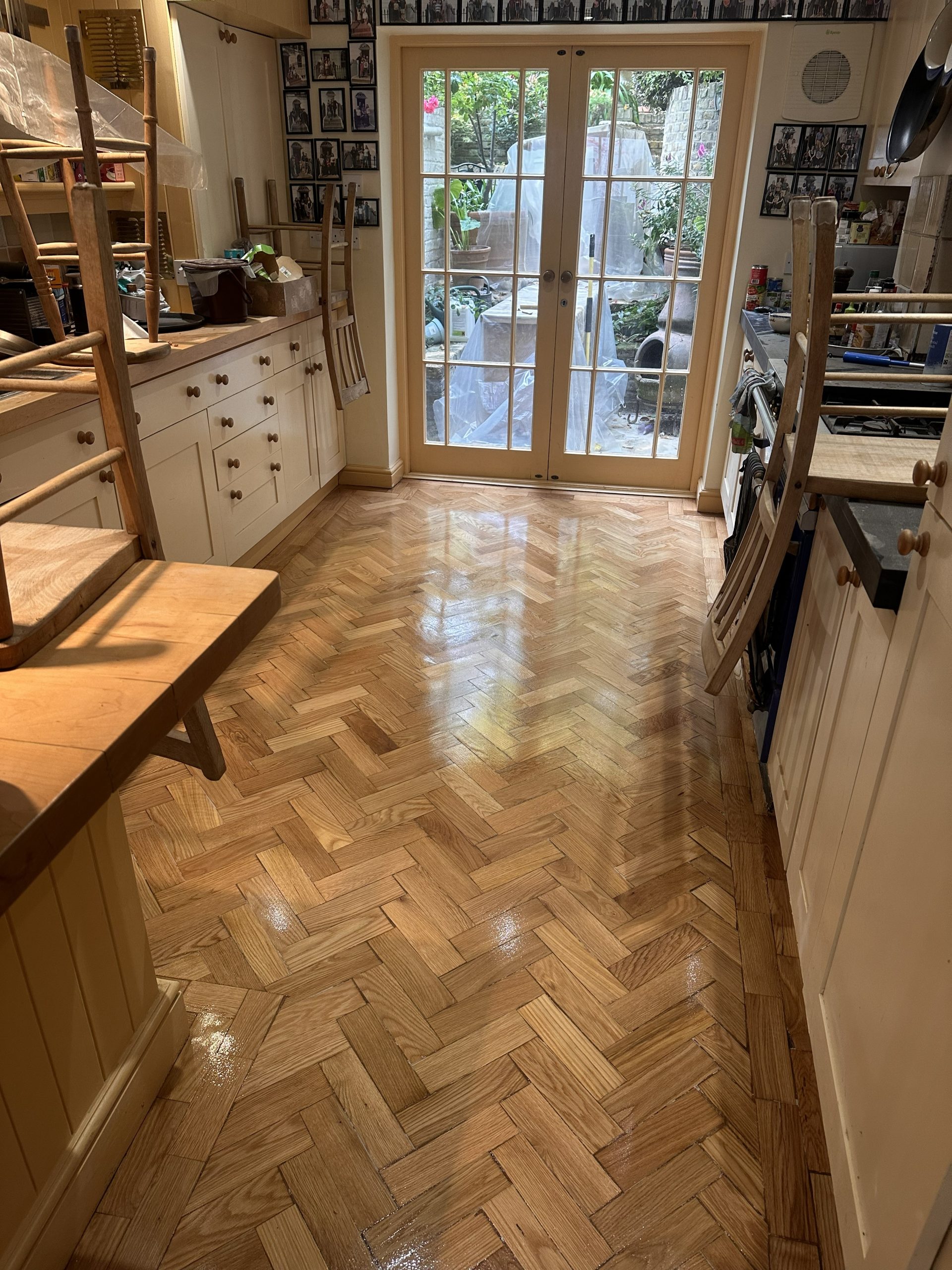 Finished oak parquet floor with gloss sheen in kitchen in Angel, London