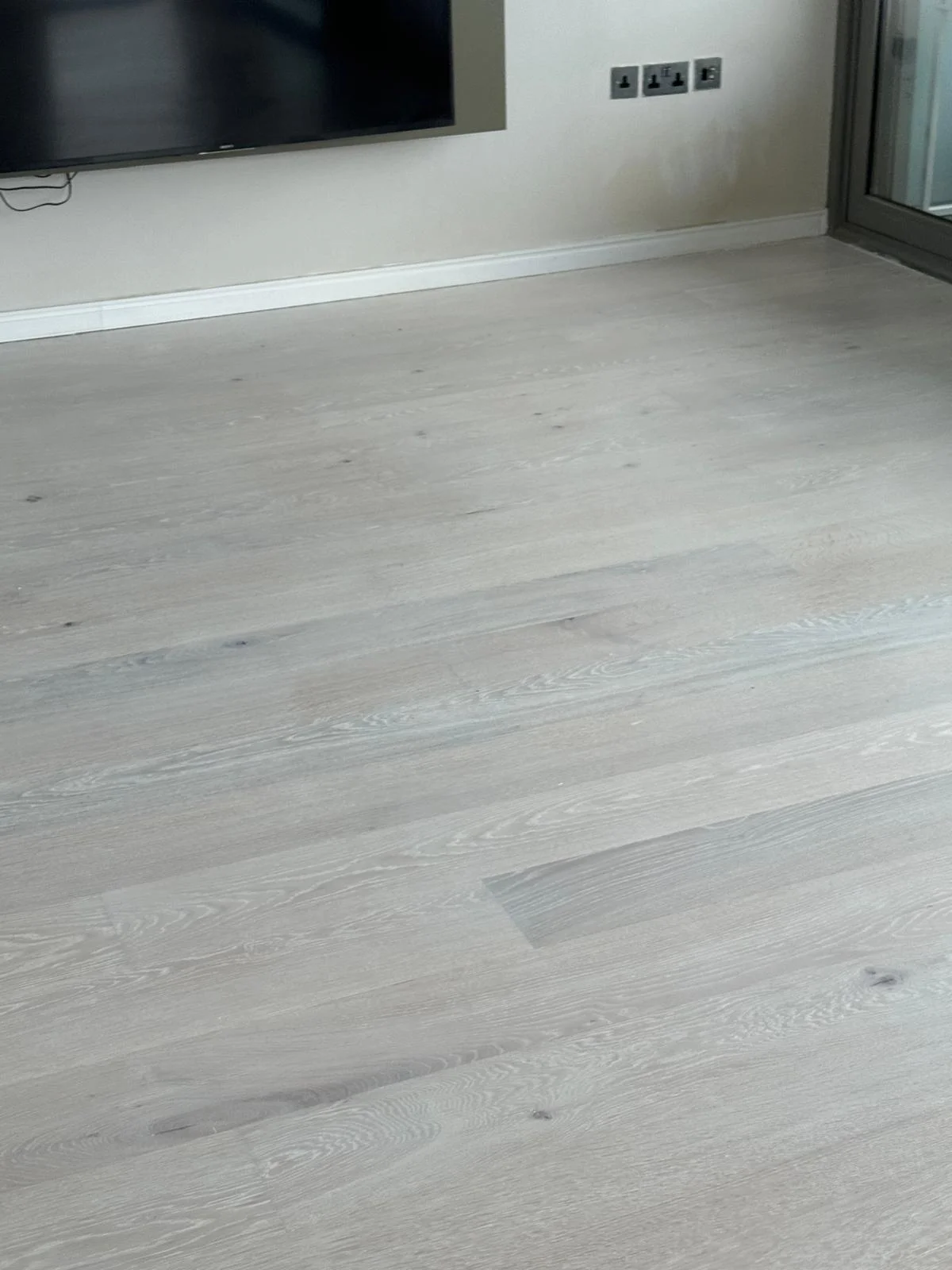Wood floor sanding and finished with Scandinavian effect white finish in London