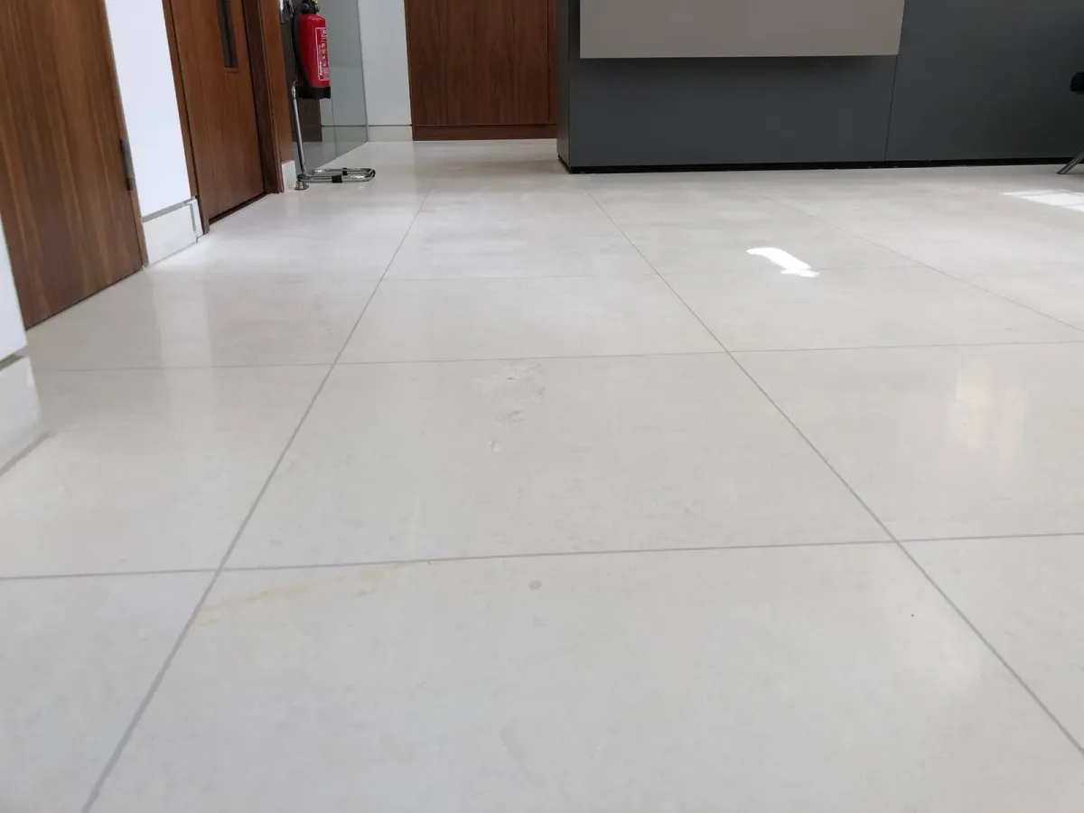 Restored limestone floor at Regents Street Medical Centre in London after professional cleaning and polishing.