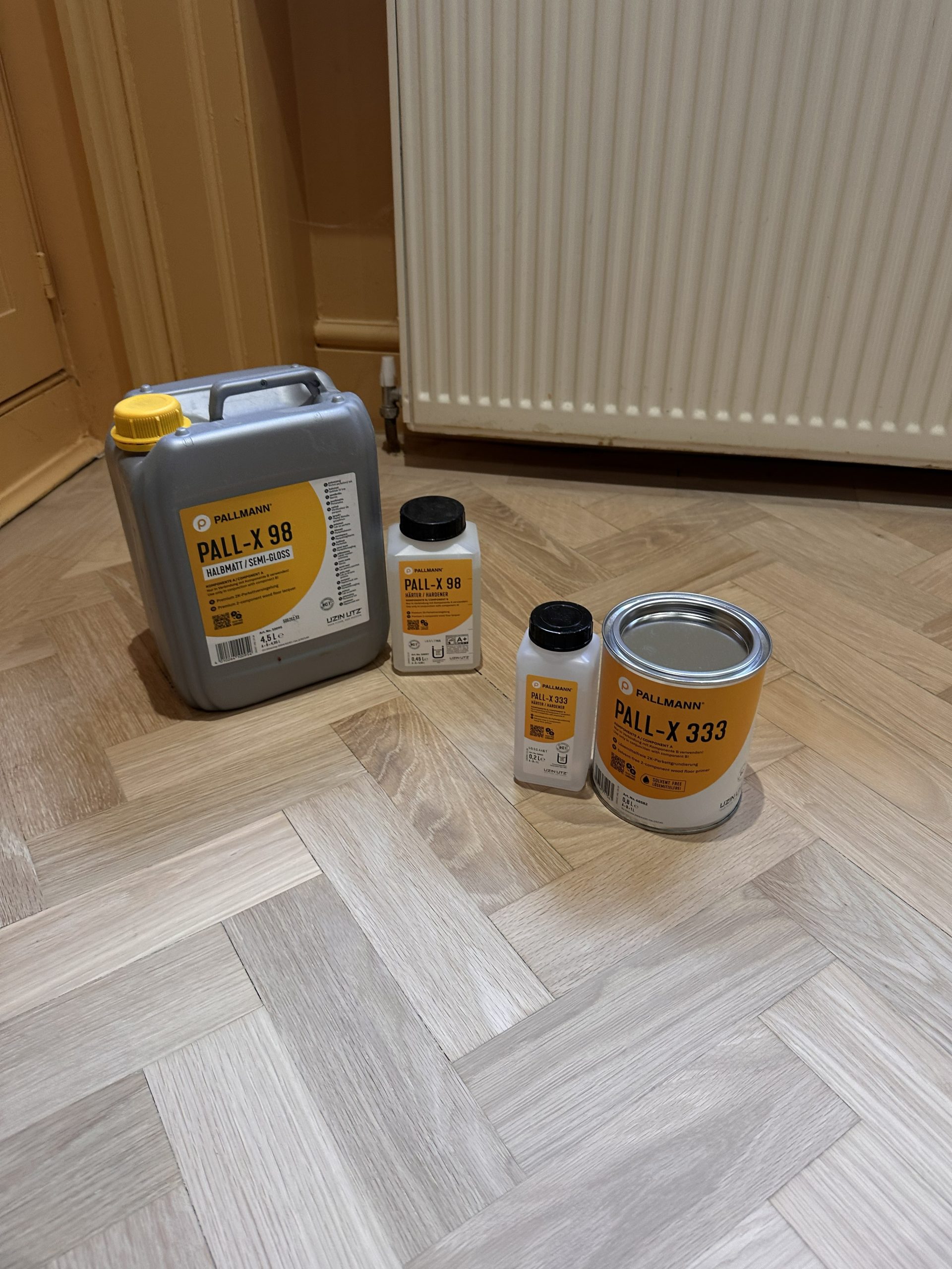 Finishing products used for oak parquet floor restoration in Angel, London