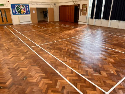 Floor repairs and sanding caterham in a school