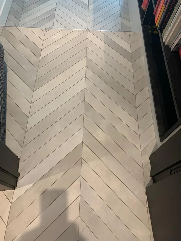 Porcelain floor in Royal Oak, London, after deep cleaning, showing a restored, bright, and stain-free surface.