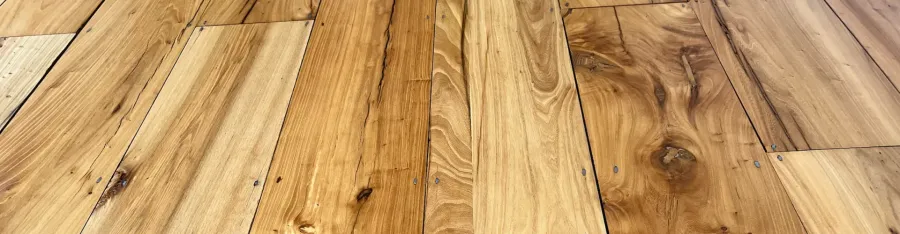 Restored Victorian pine floorboards after professional sanding in London home