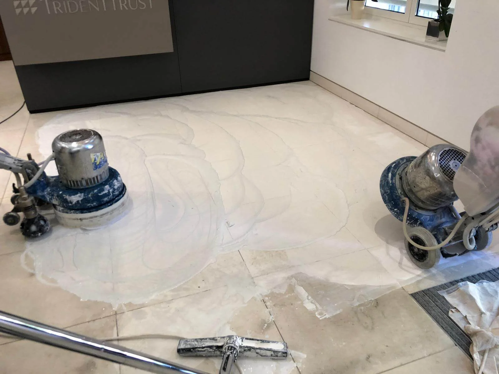 Limestone floor deep cleaning in progress at Regents Street Medical Centre, London.