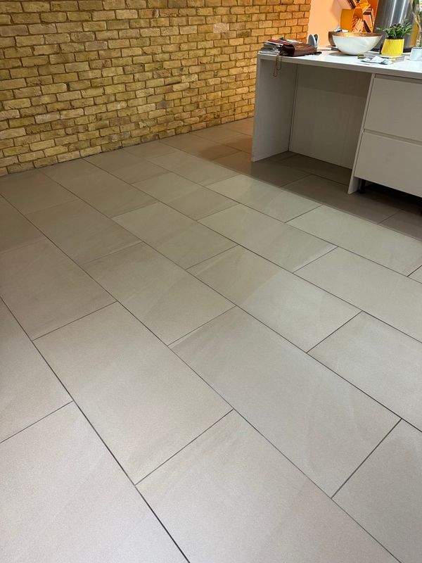 ceramic floor tile cleaning in a London kitchen and dining area