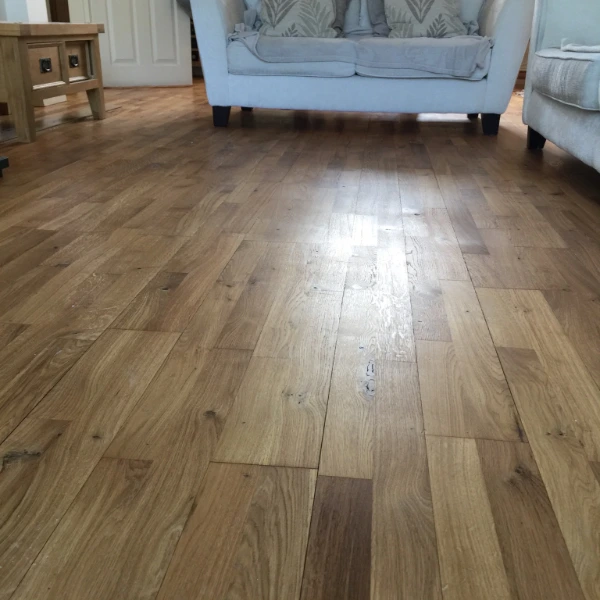 Freshly oiled wooden floor in a home, fully dried and ready for use, highlighting quick-drying efficiency.