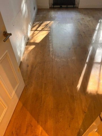 Oak floor before sanding in Highbury, London