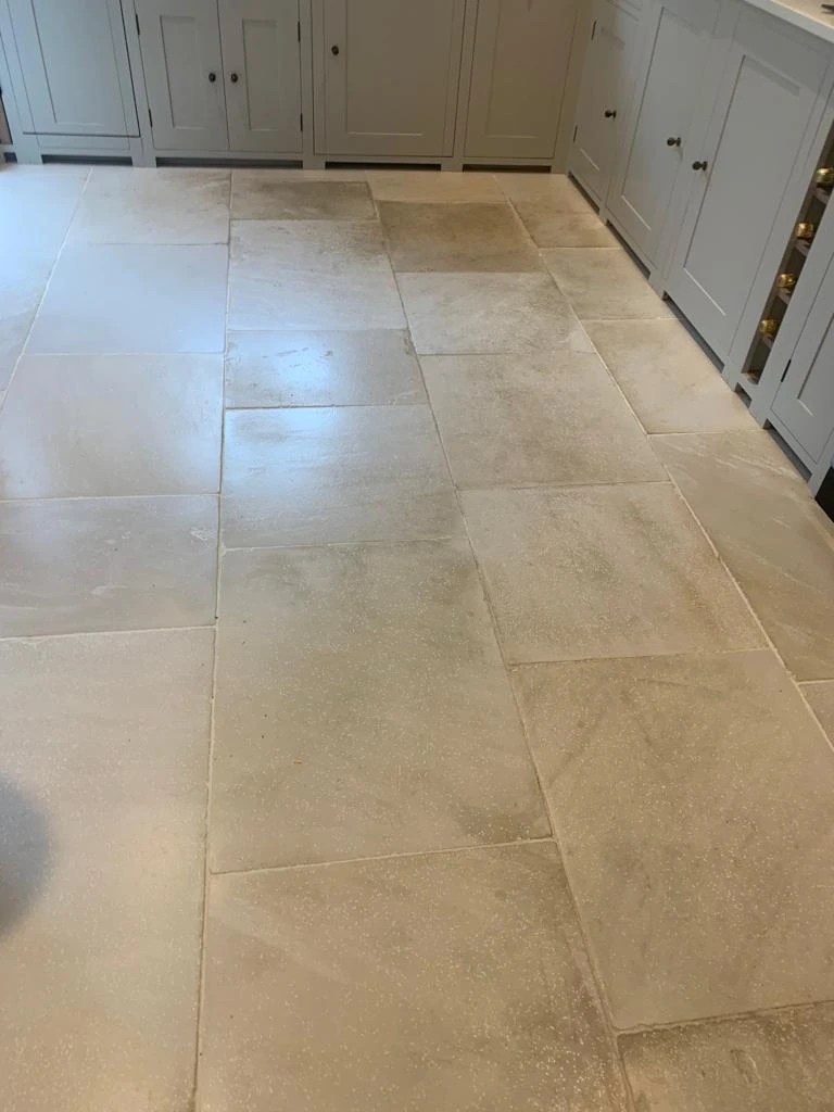 Cleaned limestone tiles in a Tooting kitchen, London