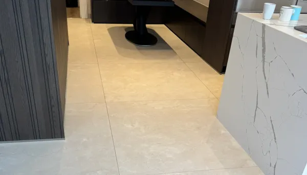Sealed textured porcelain floor in Hampstead kitchen after PU application