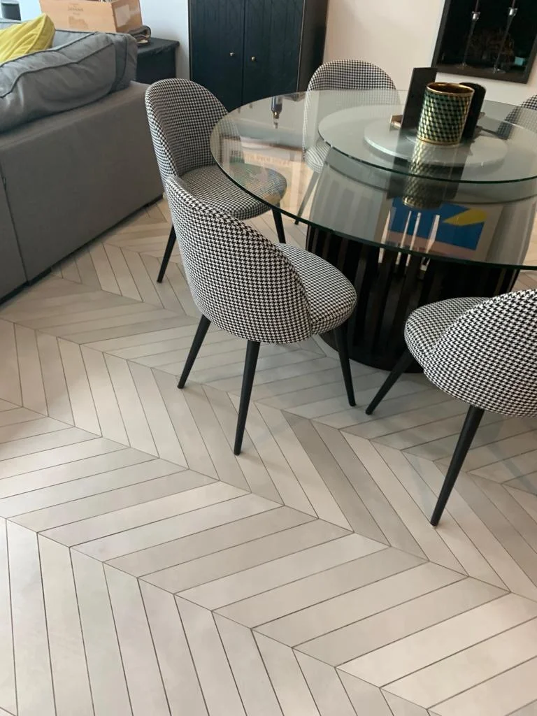 Porcelain floor in a dining area in Royal Oak, London, after deep cleaning and protective sealing for enhanced durability.