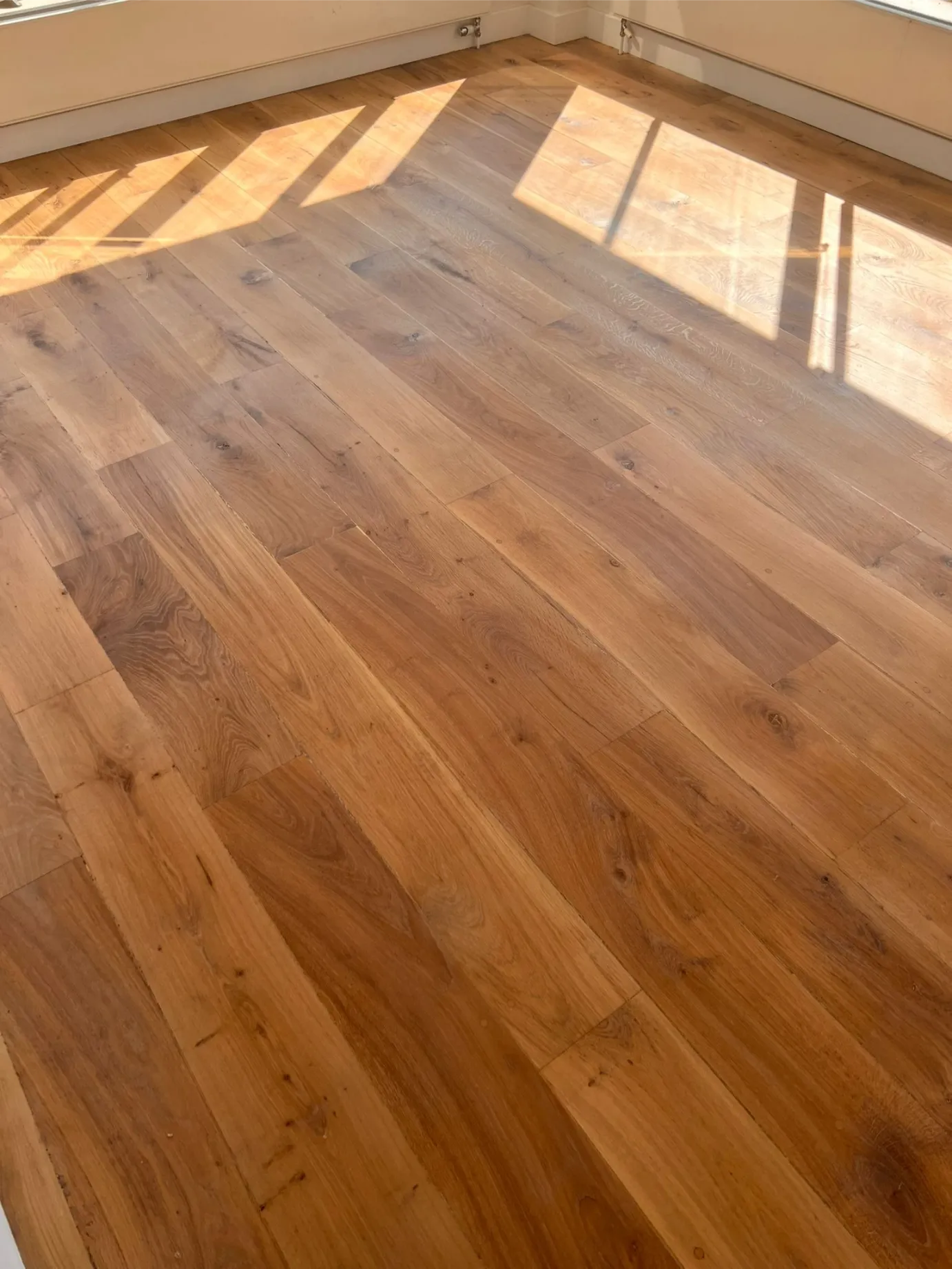 Sanding and oiling wood floor soho.webp