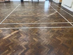 Floor repairs and sanding caterham in a school