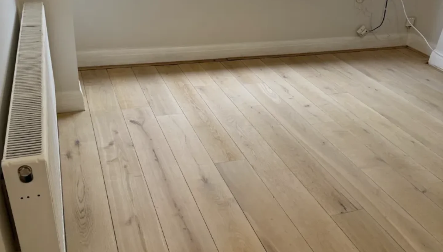 Oak floor and beading sanded and prepared for staining in Hither Green.