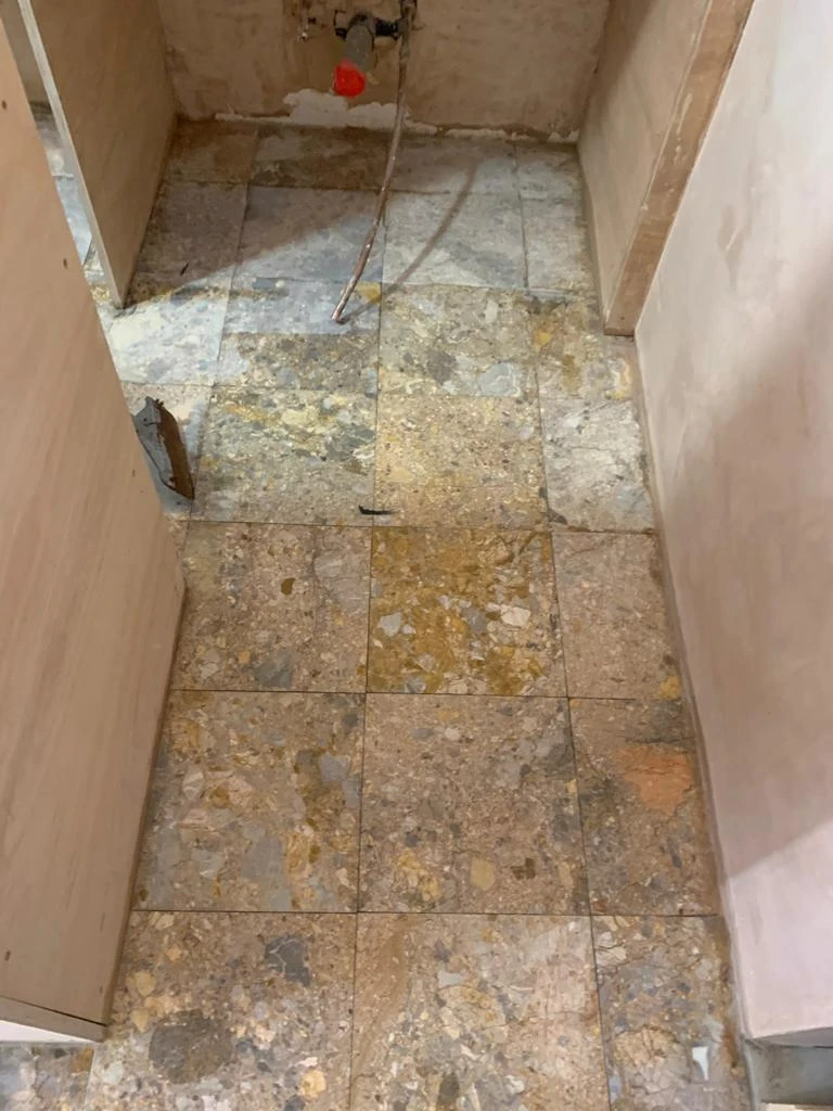 Marble floor in small service area before polishing in London