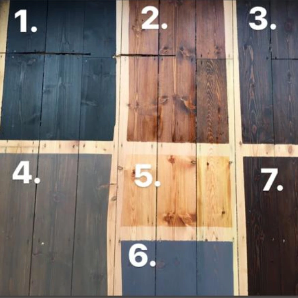 Numbered stain colour test patches on pine floorboards for floor restoration in London