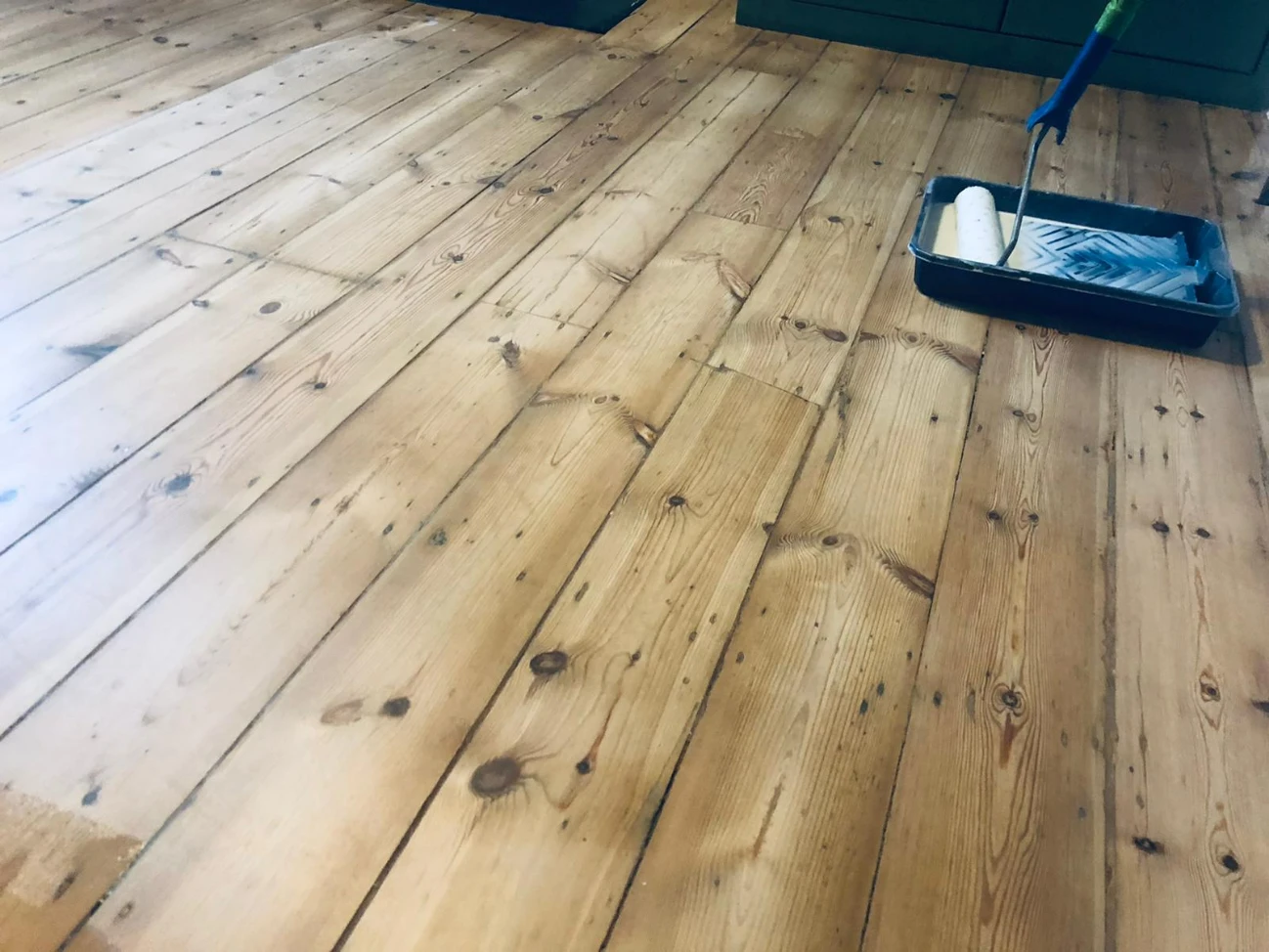 Sanded pine floorboards in a London living room