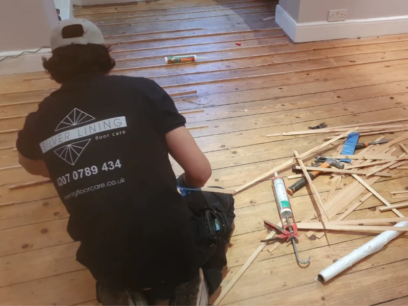 Gap filling wood slivers floorboard restoration