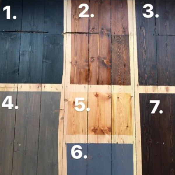 Sample selection of seven stained finishes on Victorian pine floorboards showing colour and tone variations