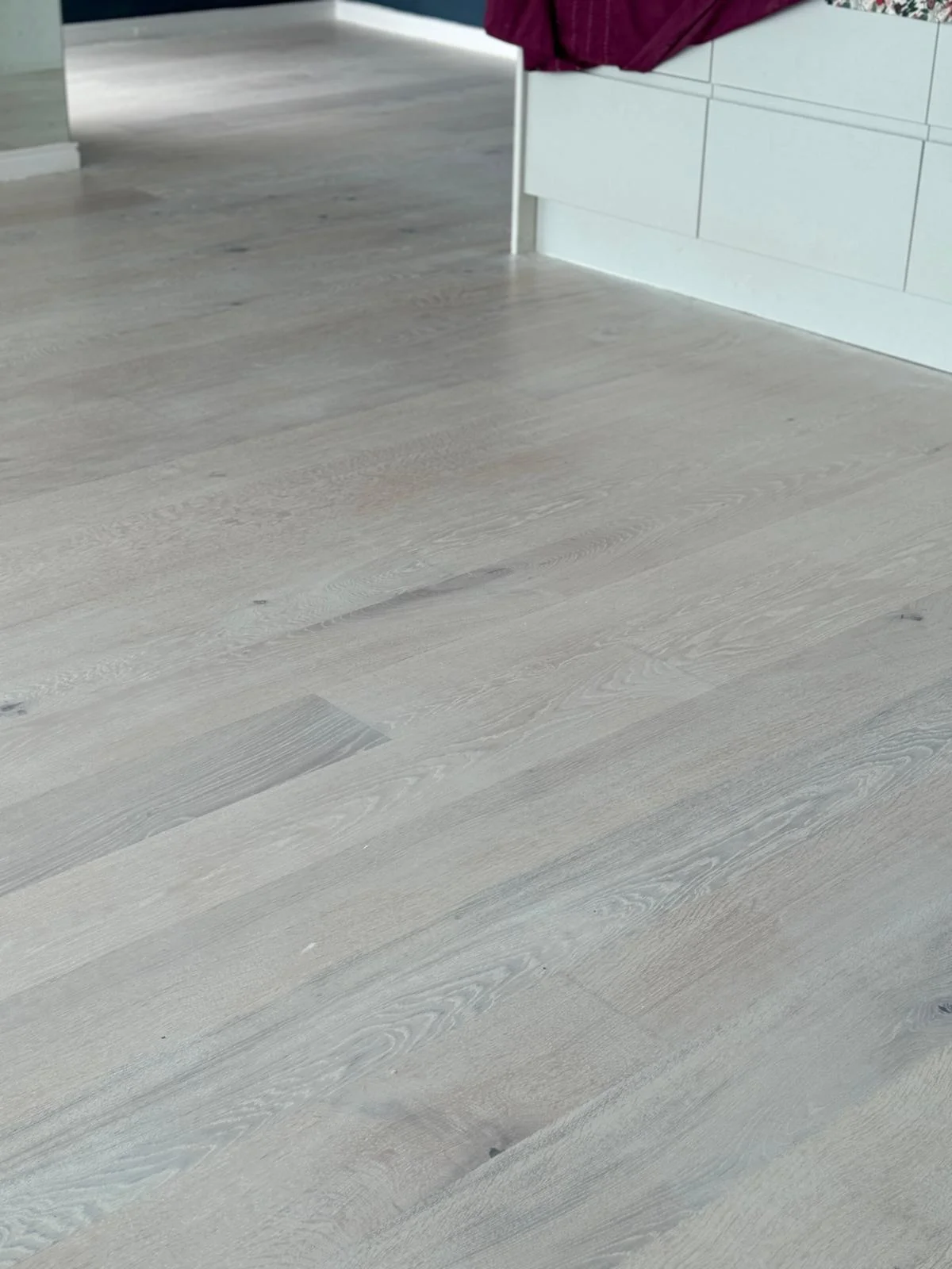 Wood floor sanding and finished with Scandinavian effect white finish in London