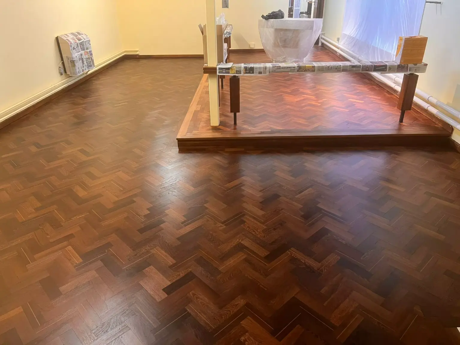 Beautifully restored Wenge floor with matte finish near altar area in church