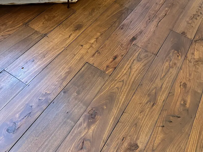 Chestnut stain on sanded pine floorboards