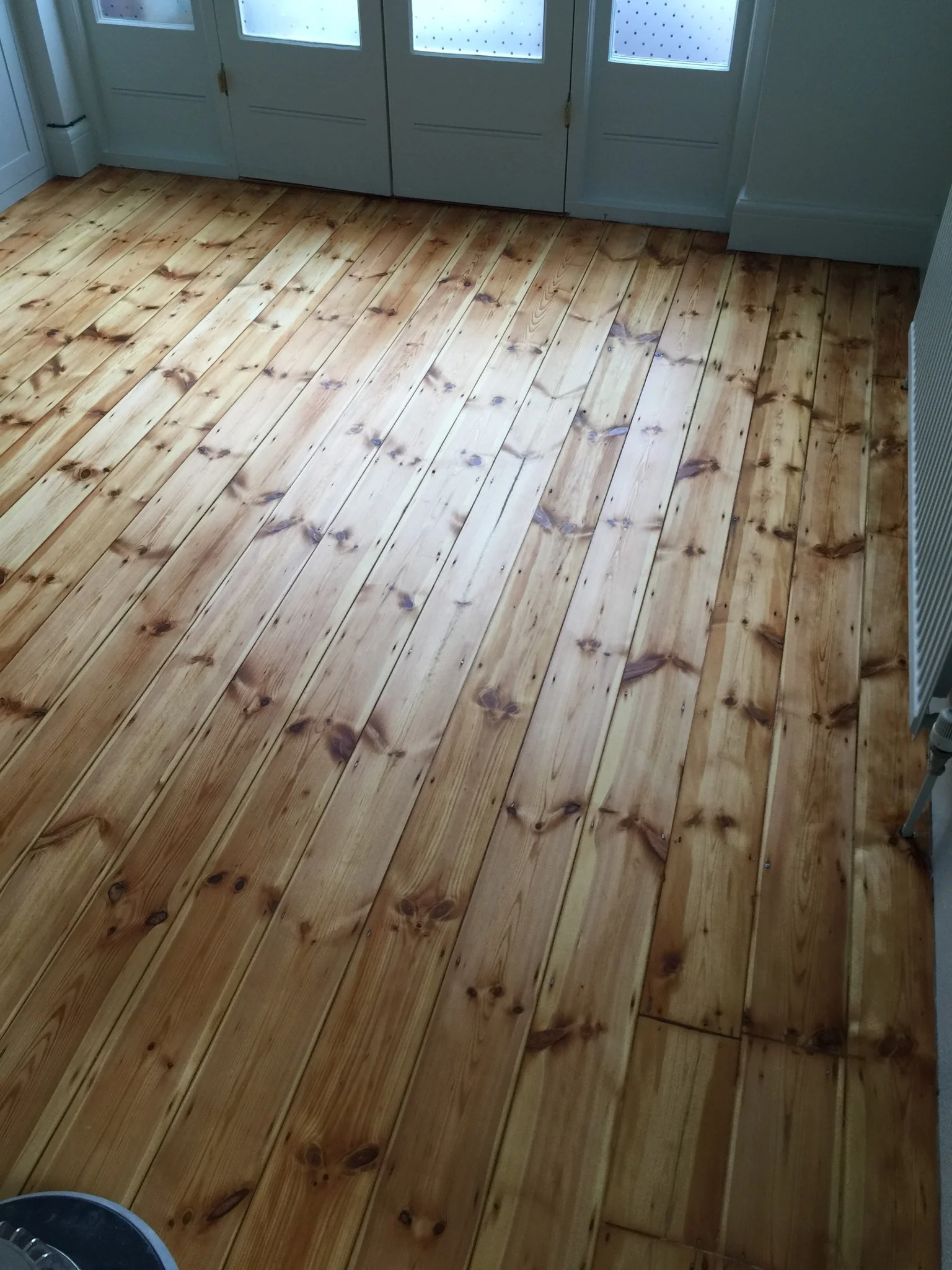 Floorboard sanding village in Dulwich, London