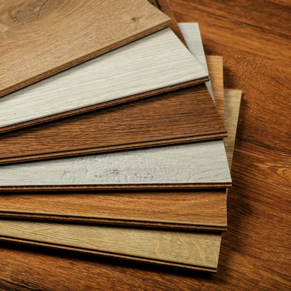 A variety of wooden floor stain samples showcasing different finishes and tones for customisation.