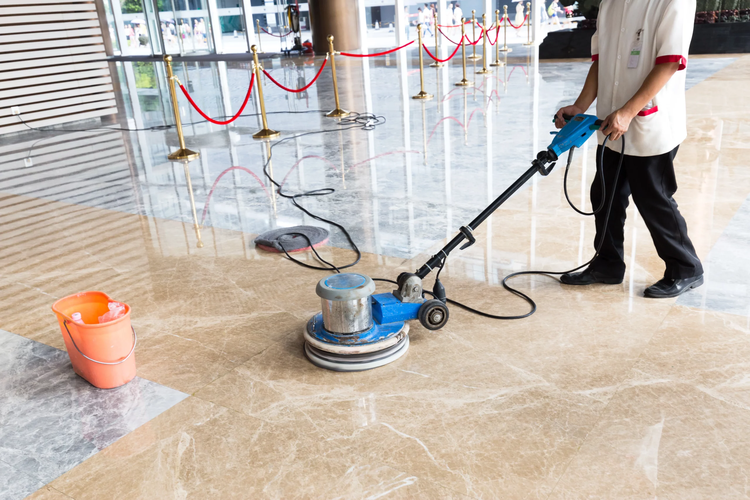 Professional marble floor polishing service in London, showing the use of specialized equipment for a polished finish.