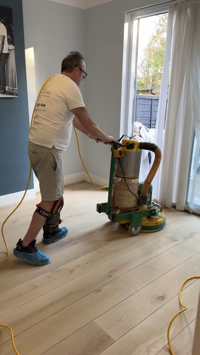 Dust-controlled wood floor sanding in a London home