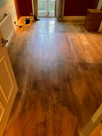 Oak floor before sanding in Highbury, London