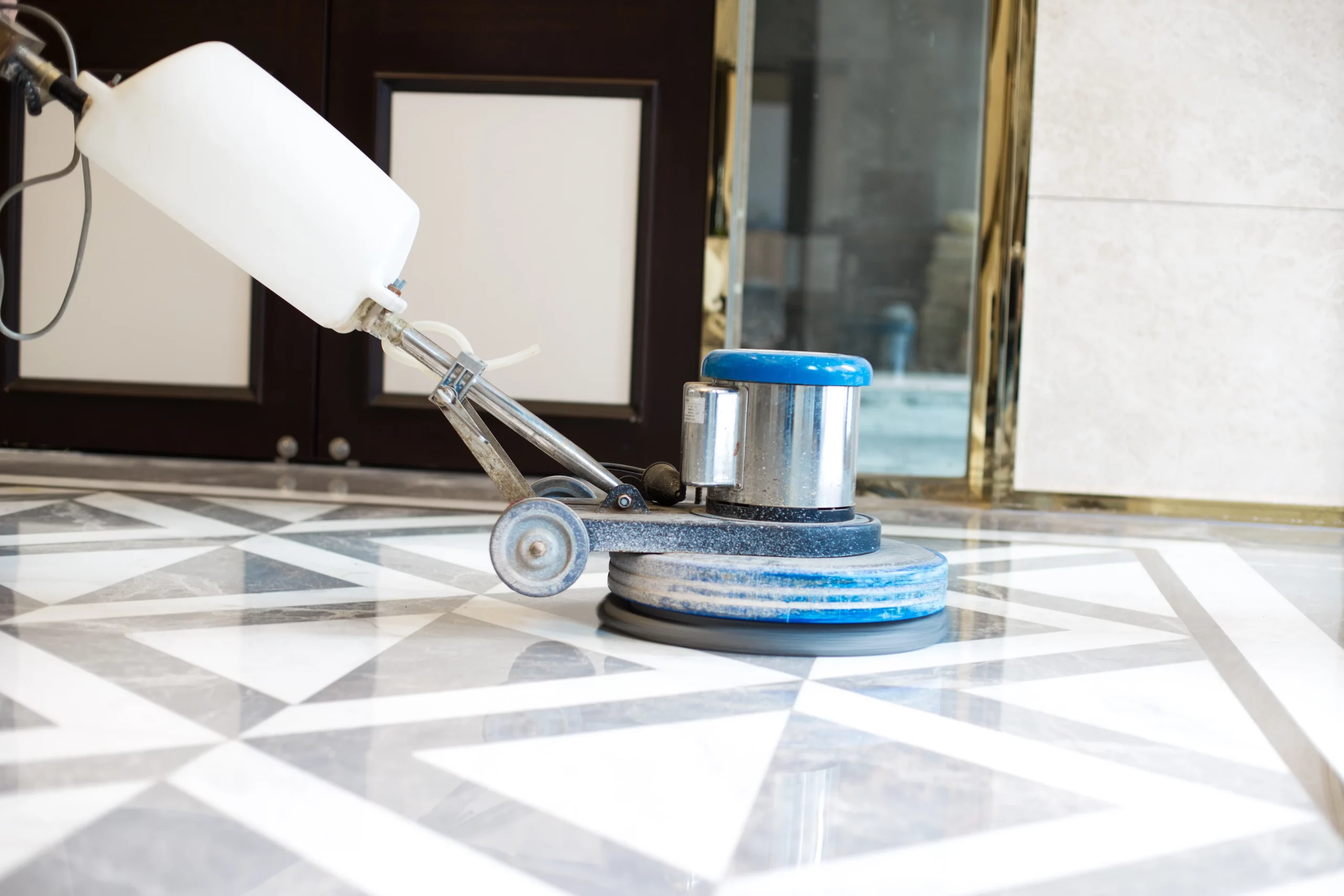 Polished marble floor in London, displaying a restored, high-gloss finish.