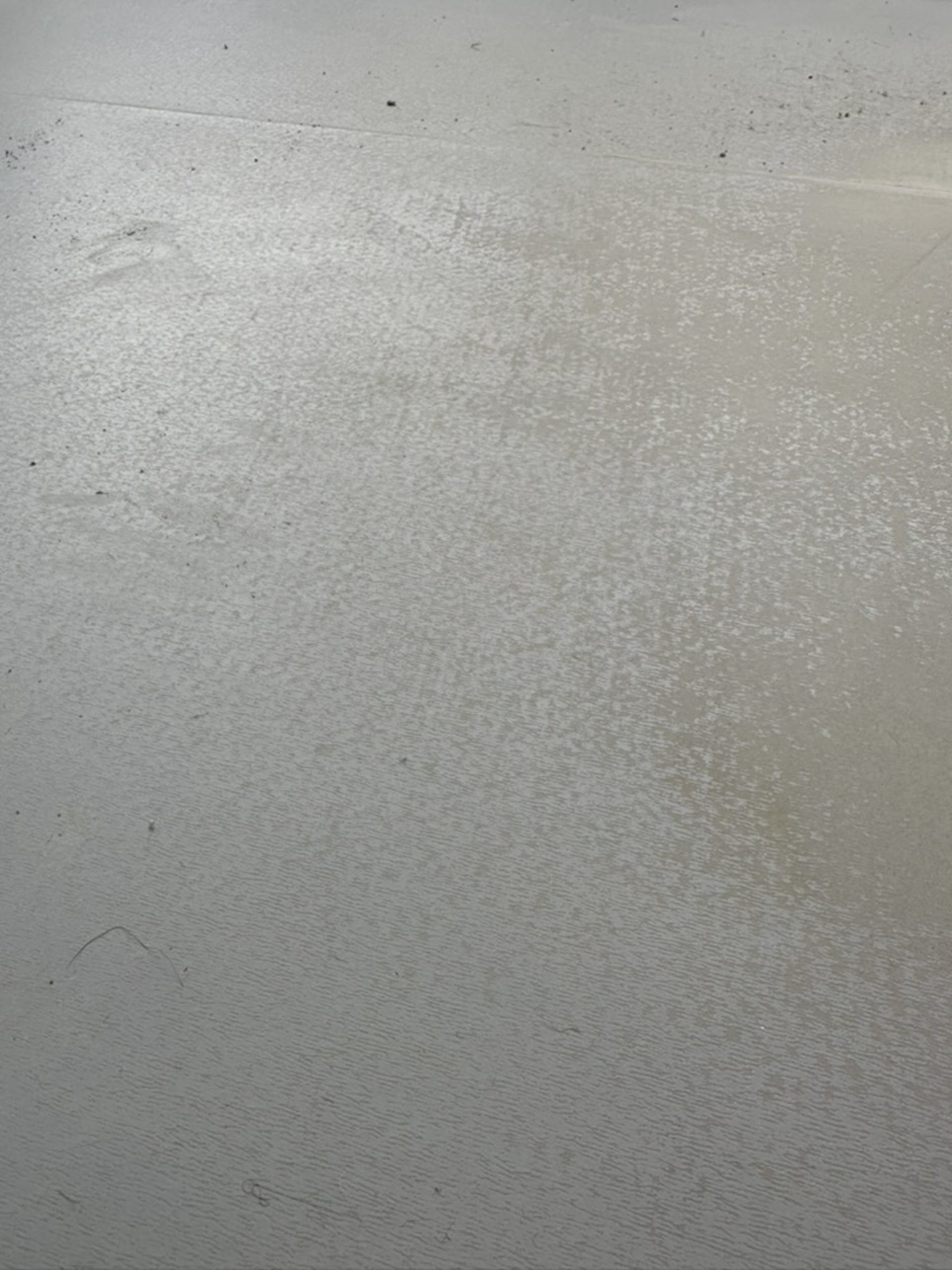 Prepared concrete subfloor after resin removal in Kennington, South London