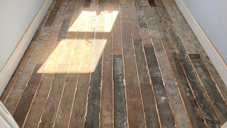 floorboard repairs - filling gaps in floorboards