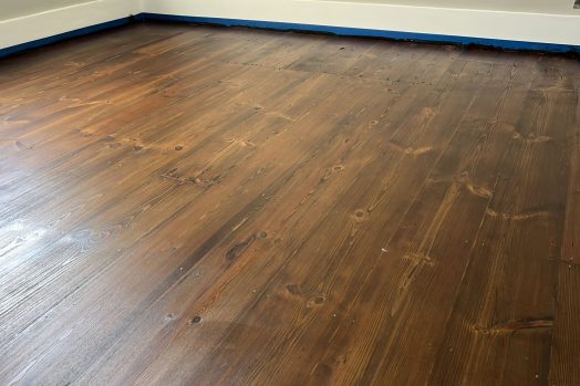 sanding and staining floorboards in Tooting